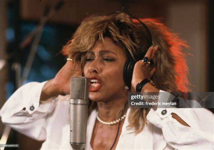 American singer Tina Turner on stage at London's Wembley Stadium in her