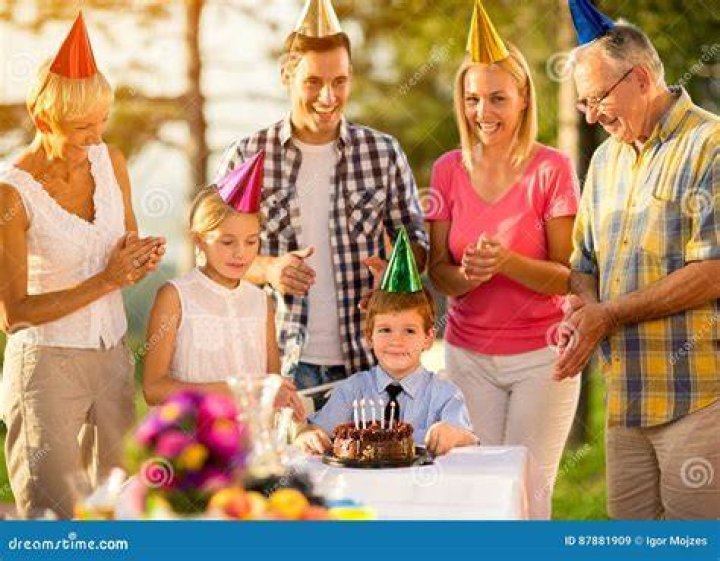Happy family celebrating birthday Royalty Free Vector Image