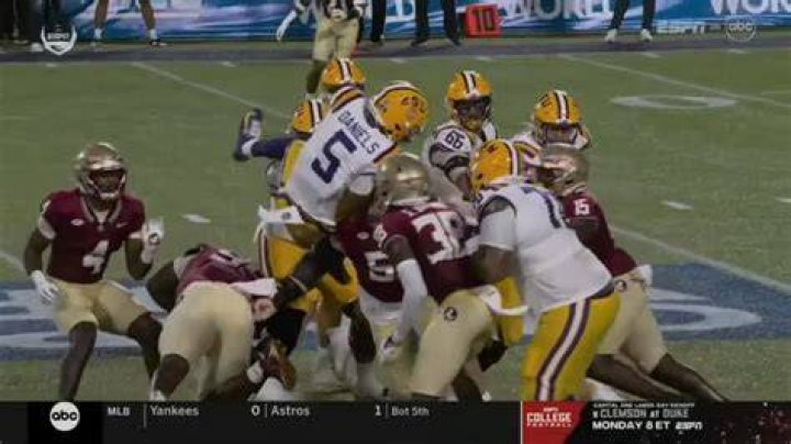 LSU QB Jayden Daniels hurdles and takes huge hit vs Florida State YouTube