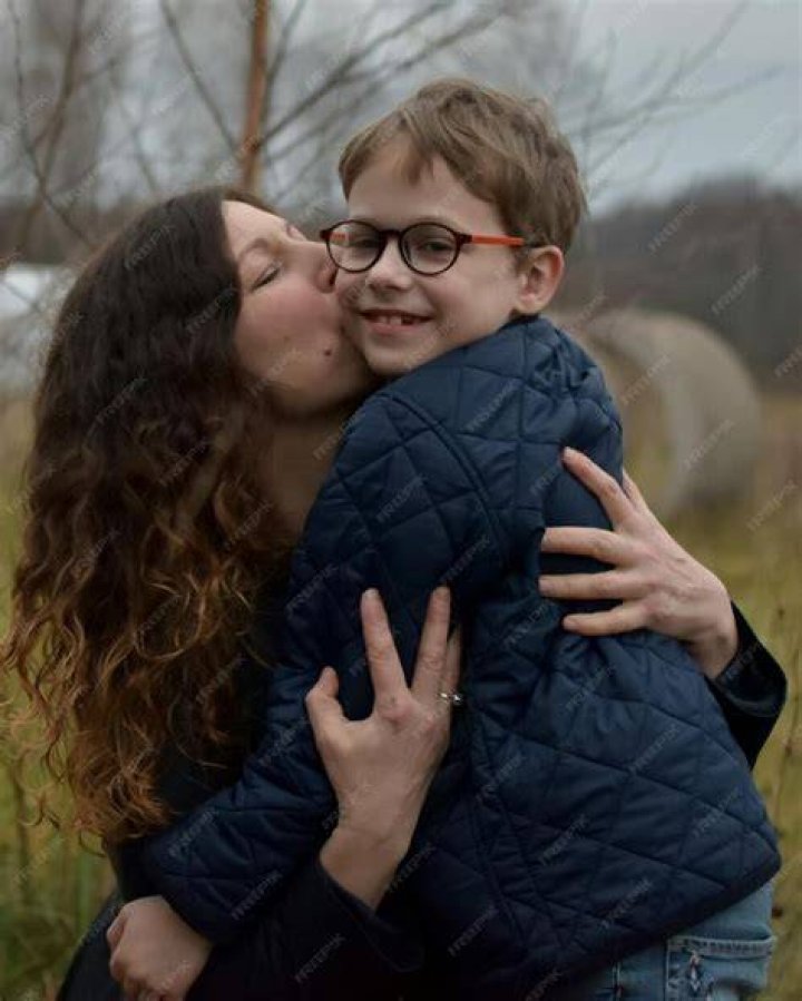 mother son outdoors kissing 1366821 Stock Photo at Vecteezy