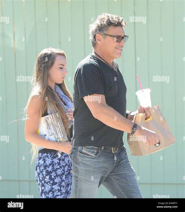 Steven Bauer and his girlfriend Lyda Loudon outside Fig and Olive in West Hollywood Featuring